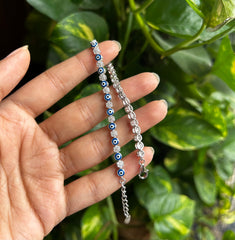 Evil eye with cz stones in flower pattern adjustable tennis bracelet in pure silver