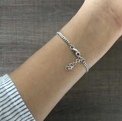 1.2 cm diameter multi cz stone studded evil eye 7'' long adjustable bracelet in pure silver