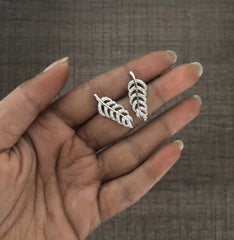 Multi cz stone leaf pattern studs in pure silver