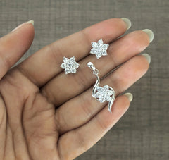Six petal cz flower earring and curved edges pendant set in pure silver