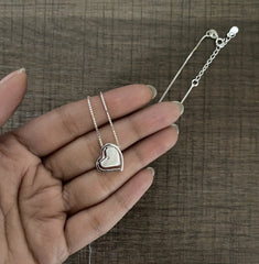 Heart in heart pattern pendant with an 18'' chain in pure silver