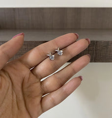 Small single cz stone V shape studs in pure silver