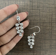 Eight cz cut stone oxidized finish hangings in pure silver