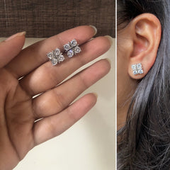 Four cz stone 1 cm diameter studs in pure silver
