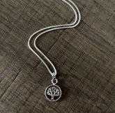 1.3 diameter Tree of Life pendant with an 18'' chain in pure silver