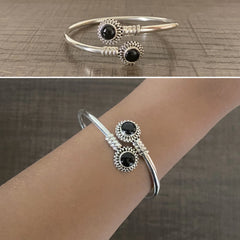 Round rava pattern natural black cabstone twisted kada in pure silver