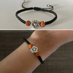 Flower motif and Rudraksh beads adjustable black thread bracelet in pure silver