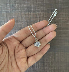 7mm cz stone curved border pendant and an 18’’ chain in pure silver