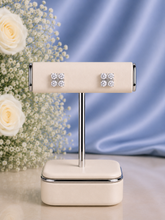 Four cz stone 1 cm diameter studs in pure silver