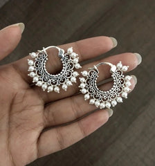 2.5 cm diameter filigree balis with single line of shell pearls in pure silver