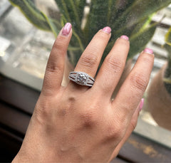 Multi cz stone three line ring with a single round cz center and cushion border in pure silver