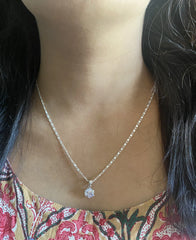 8mm transparent cz stone six prong pendant with an 18'' Figaro chain in pure silver