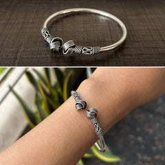 Knotted ends with carving word borders plain kada in pure silver