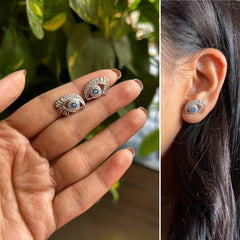 Dramatic curled eye lash cz studs studs in pure silver