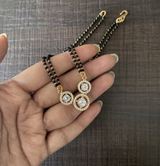 Three circle cz stone pendant in pure silver with 22kt gold plating and an 18’’ artificial chain