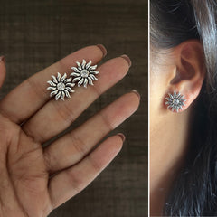 Surya pattern studs with a cz stone in pure silver