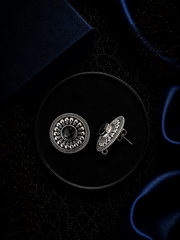 2.1 cm diameter carving rava work studs with a black onyx cut stone center in pure silver