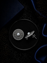 2.5 cm diameter rava work studs with a pearl center in pure silver