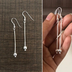 6.5 cm long ball with a silver chain hangings made in pure silver