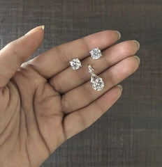 7mm cz stone studs with an inverted 'v' 8mm cz pendant set in pure silver
