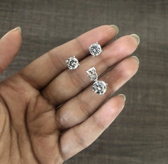 7mm four prong cz stone studs with an 8mm cz stone pendant in pure silver