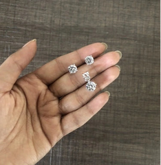 7mm four prong cz stone studs with an 8mm cz stone pendant in pure silver