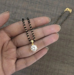 8mm single cz stone pendant in pure silver with 22 kt. gold plating suspended from an 18'' artificial chain