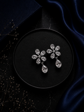 Flower with tear drop cz stone bezel setting studs in pure silver