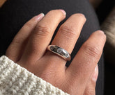 Thick band ring with three cz stones in pure silver