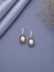 Oval rava work pearl center loops in pure silver