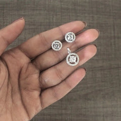 9mm multi cz stone studs with a 1.1 cm diameter pendant in pure silver