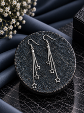 Star shaped 7.5 cm long hangings crafted in pure silver
