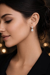 Delicate two cz stone 1.4 cm long tear drop studs in pure silver