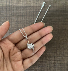 Six petal cz stone flower pattern with curved ends and an 18'' chain in pure silver