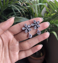 Flower with tear drop cz stone bezel setting studs in pure silver