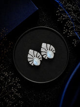 Multiple cz stone peacock feather motif earstuds with a pearl center in pure silver