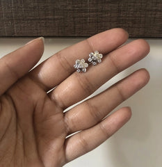 Tiny cz stone flat flower studs in pure silver
