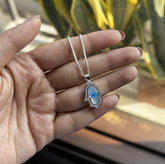 Hamsa pendant with cz stones and an 18’’ chain in pure silver