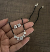 Five cz stone 18'' long mangalsutra with matching 7mm cz studs in pure silver