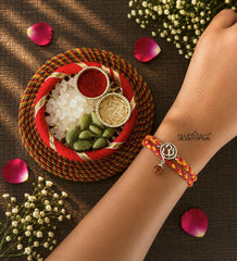 Silver Round om with hanging rudraksh rakhi