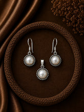 1.2cm diameter fresh water pearl rava work hangings with a matching pendant in pure silver