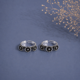 Three flower pattern antique finish toe rings in pure silver (one pair)