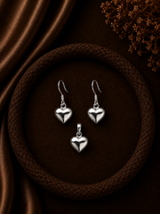 Hollow heart earring and pendant set in pure silver