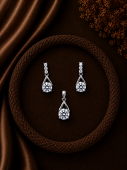Four cz stone studs along with a matching 8mm cz pendant set in pure silver