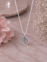 1.2cm diameter Om in circle pendant with an 18inch chain in pure silver