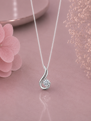 Paisley pattern pendant with a 6mm cz stone along with an 18'' chain in pure silver