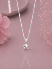 Single cz stone star pendant with an 18'' chain in pure silver