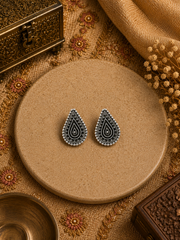 Tear drop pattern carving work and rava border antique studs in pure silver