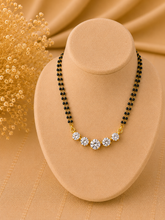 Five cz stone pendant in pure silver with 22 kt. gold plating suspended from an 18'' artificial chain