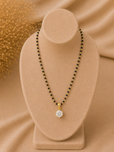 8mm single cz stone pendant in pure silver with 22 kt. gold plating suspended from an 18'' artificial chain